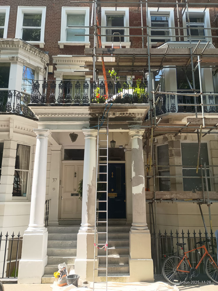 Exterior damage and scaffolding before renovation, Chelsea site