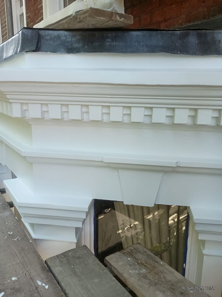 Bay window repaired and repainted, Chelsea renovation